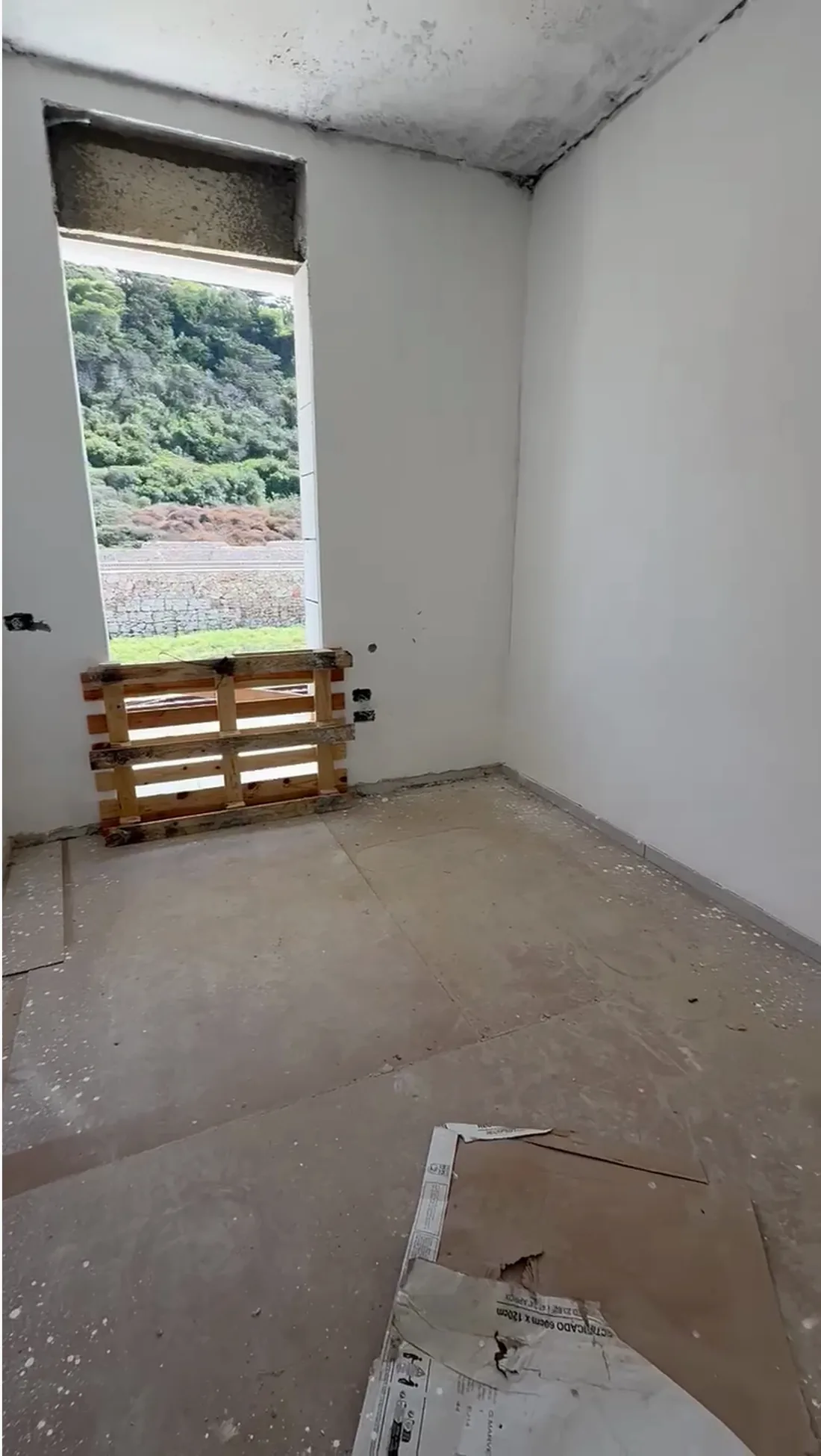 The bedroom and balcony door on site